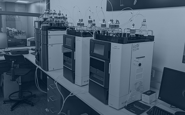 cGMP Analytical Development at CatSci Blue-toned image of Analytical Science laboratory and equipment