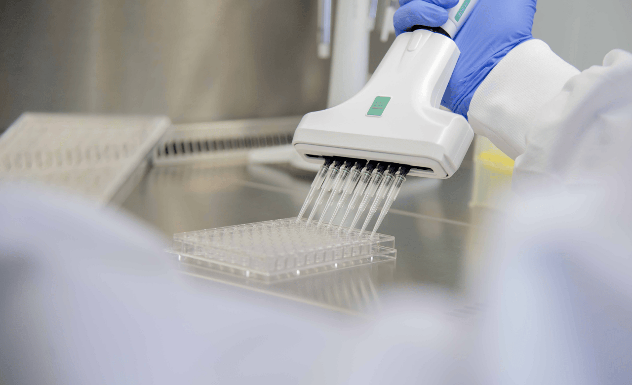 image of multi-pipette in a lab for integrated drug discovery