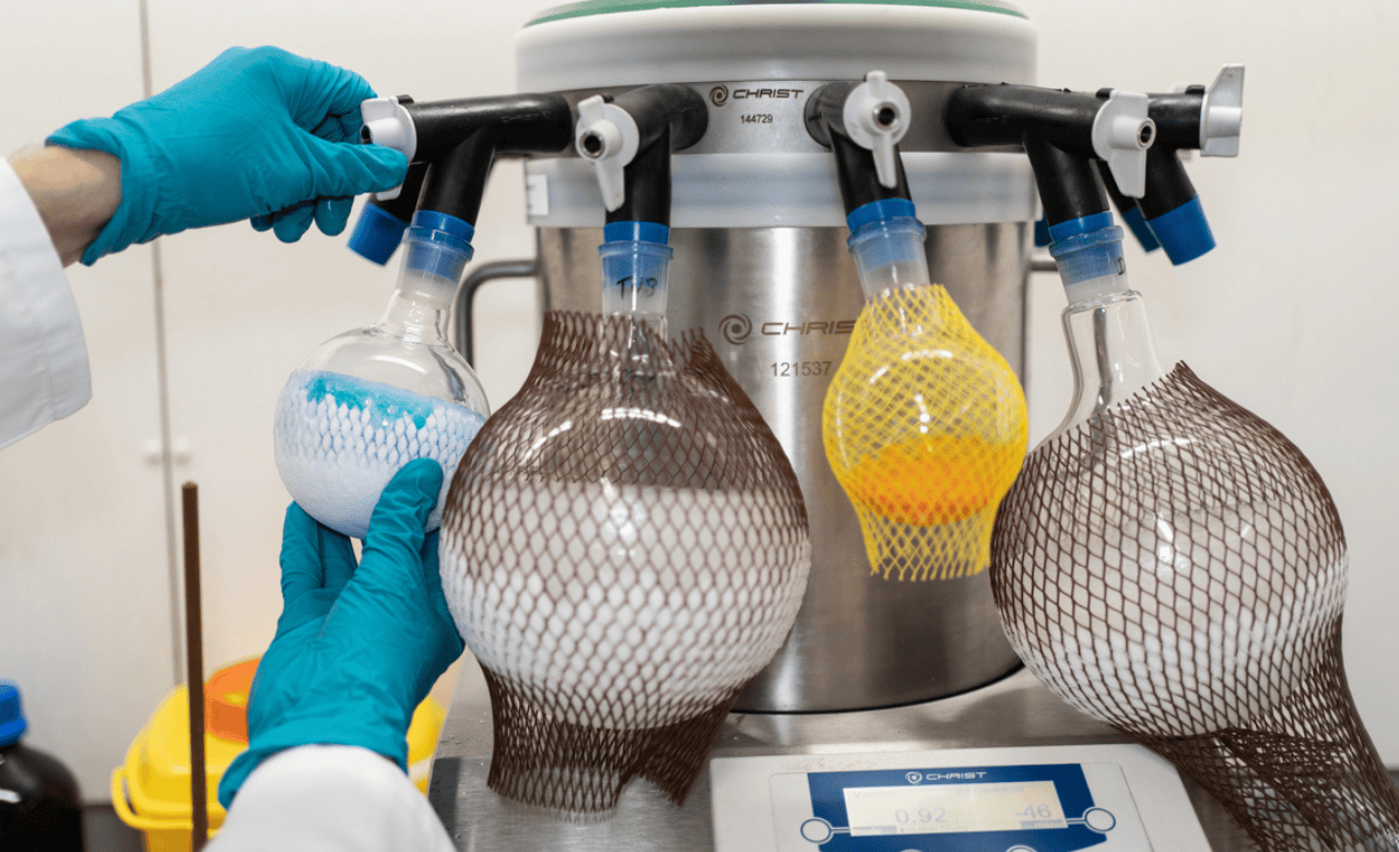 image of a scientist's gloved hands working on separation science samples